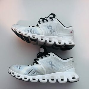 On Cloud tennis shoes.